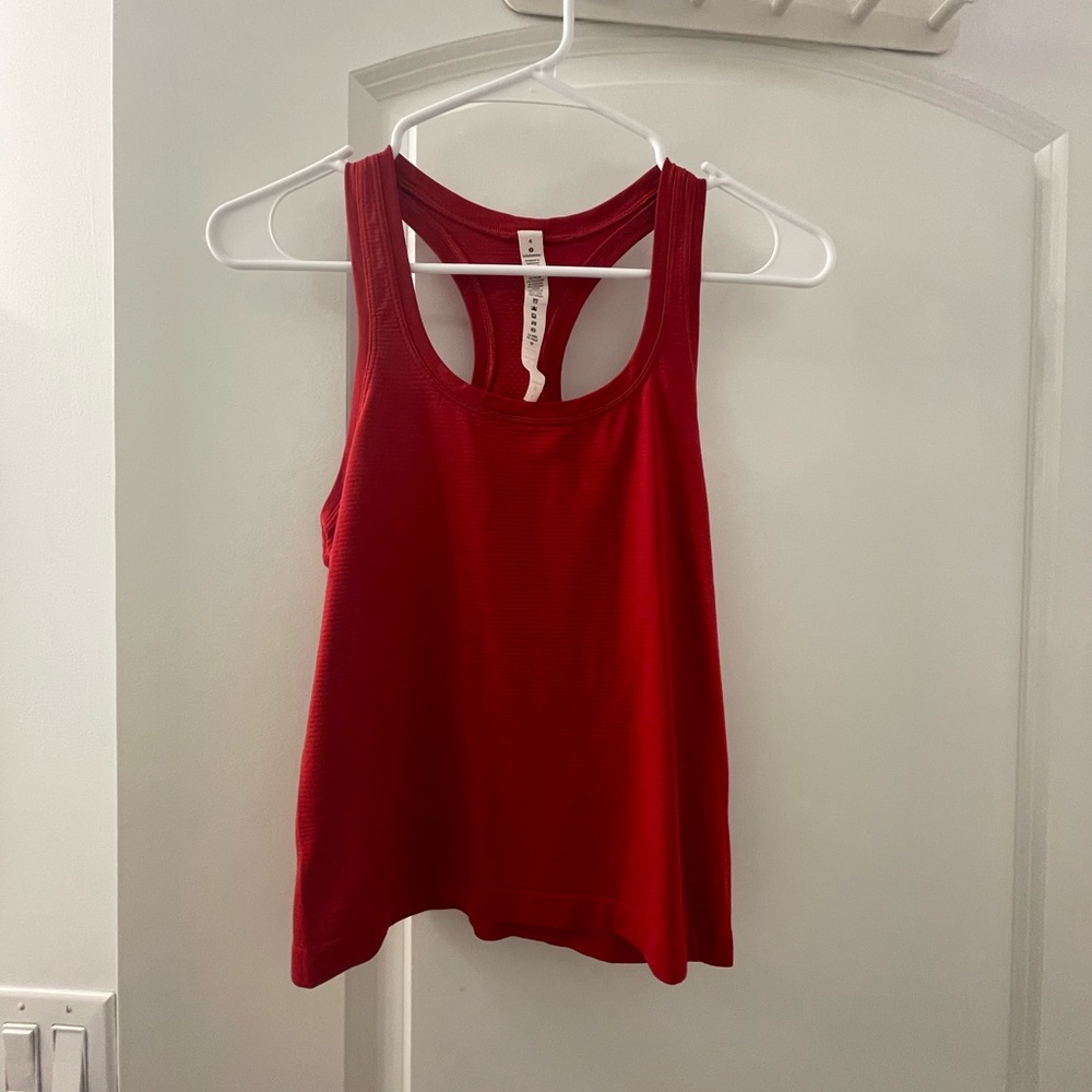 LULULEMON-size 4-red swiftly tech race length-excellent condition.